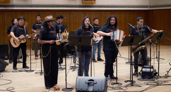 A band performs in Bates Recital Hall.